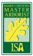 ISA Board Certified Master Arborist credential badge logo with a yellow oak leaf on a dark green background